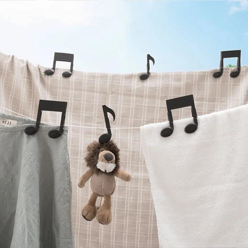 2個入り 音符型洗濯バサミ ブラック スプリングクリップ ク - Baby Clothing Drying Rack のレビューと価格